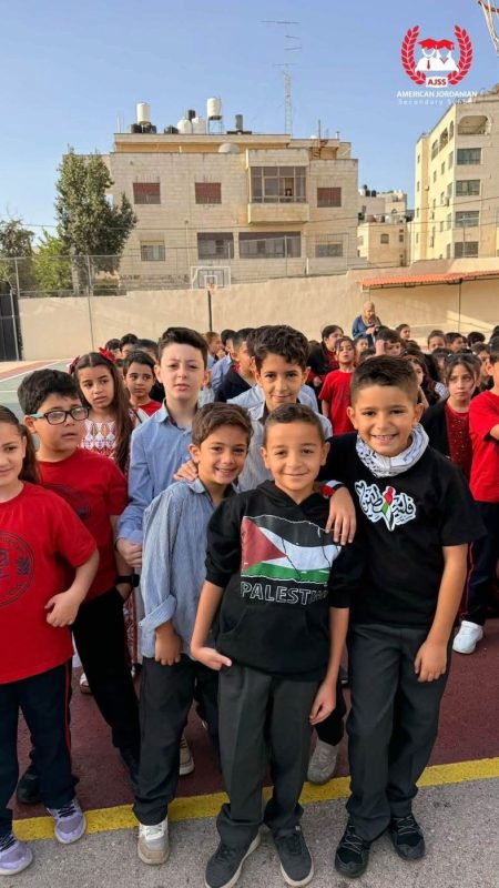 Students gather in the school courtyard